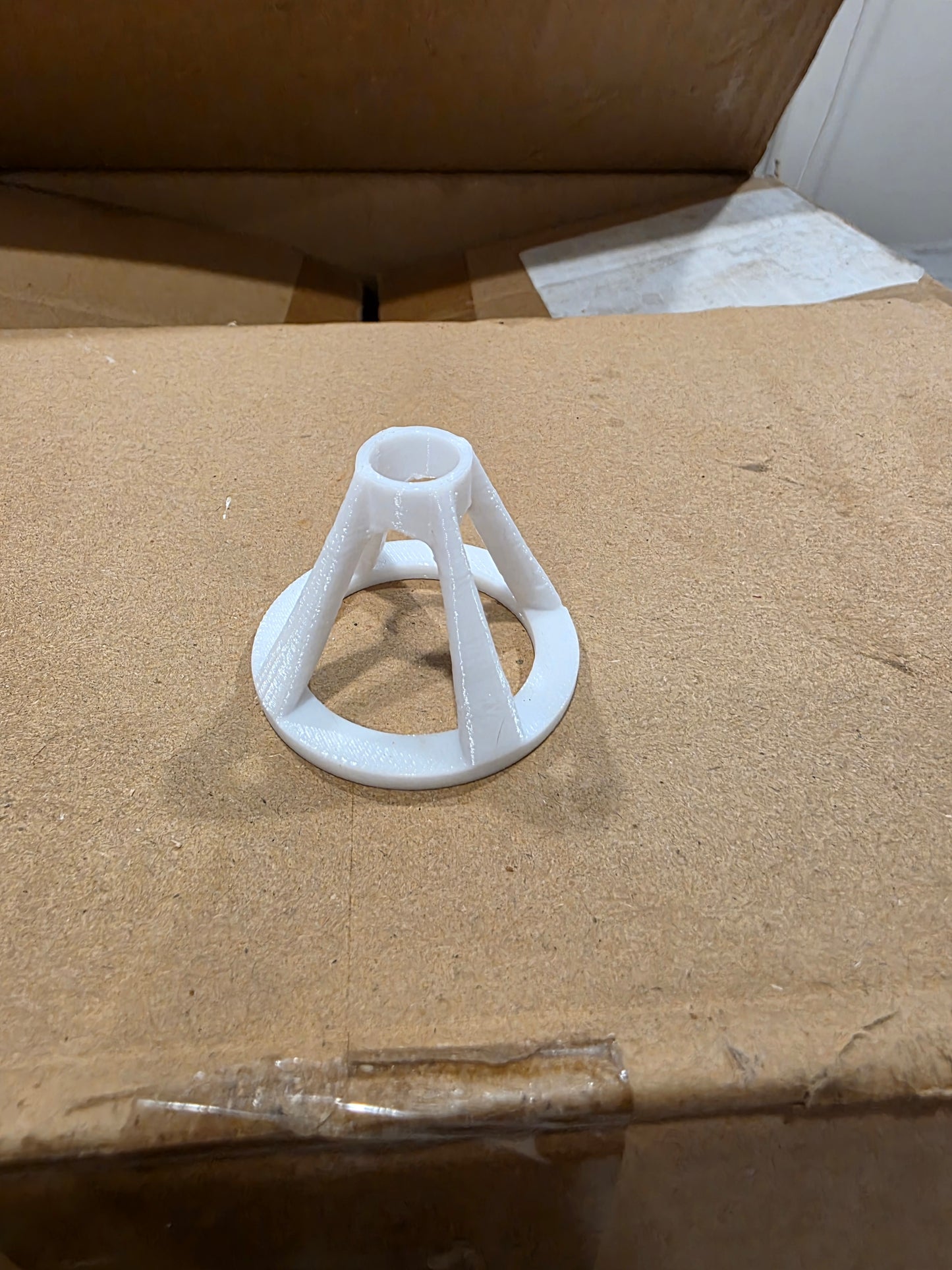 White 3D printed frag pulg holder